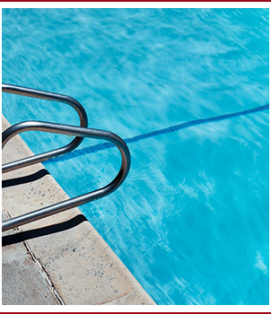 Side view of a pool rail in a pool