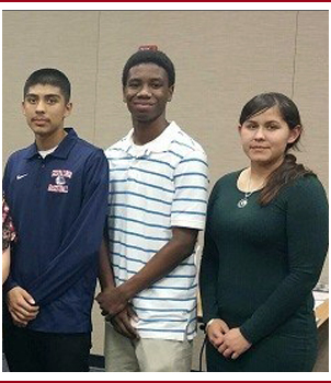 Three students pose together