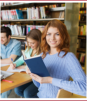 student in library